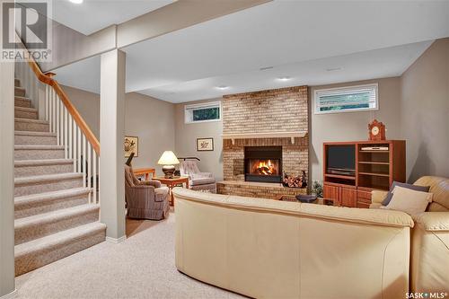 114 801 Heritage Crescent, Saskatoon, SK - Indoor Photo Showing Basement With Fireplace