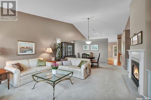 114 801 Heritage Crescent, Saskatoon, SK - Indoor Photo Showing Living Room With Fireplace