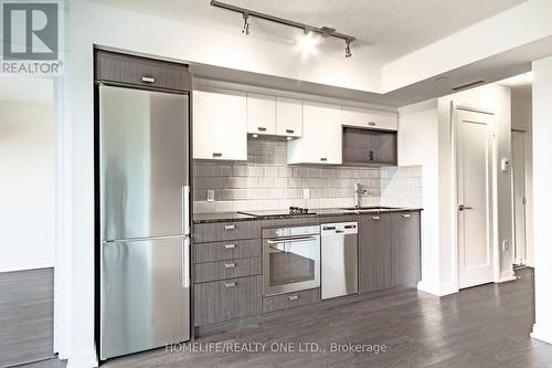 719 - 275 Village Green Square, Toronto (Agincourt South-Malvern West), ON - Indoor Photo Showing Kitchen With Stainless Steel Kitchen