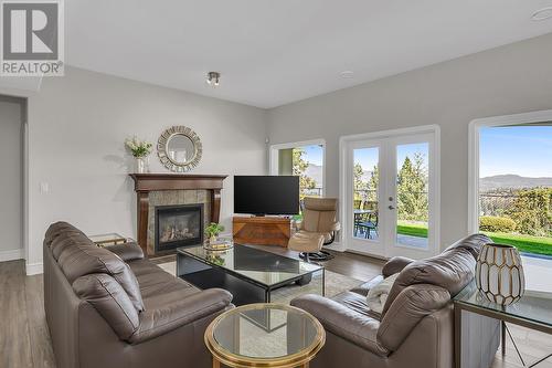 4822 Carmel Crescent, Kelowna, BC - Indoor Photo Showing Living Room With Fireplace