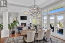 4822 Carmel Crescent, Kelowna, BC  - Indoor Photo Showing Dining Room With Fireplace 