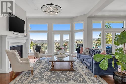 4822 Carmel Crescent, Kelowna, BC - Indoor Photo Showing Living Room With Fireplace