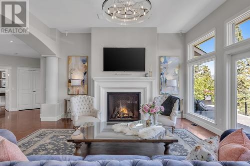 4822 Carmel Crescent, Kelowna, BC - Indoor Photo Showing Living Room With Fireplace