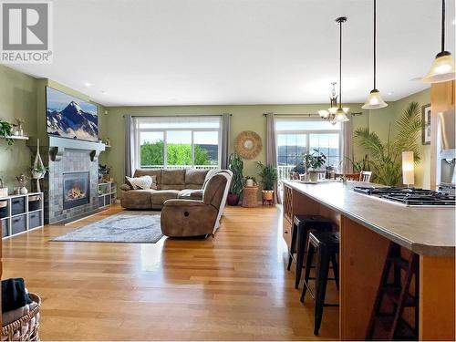 128 375 Mandarino Place, Williams Lake, BC - Indoor Photo Showing Living Room With Fireplace