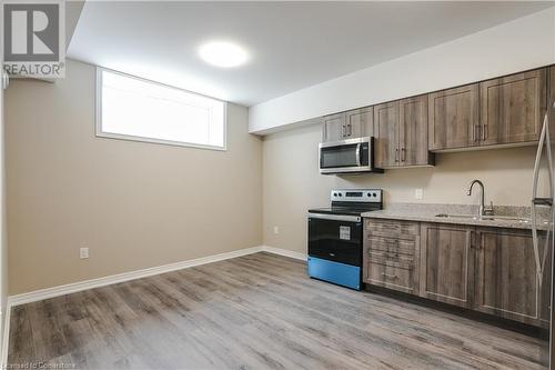 183 Rykert Street Street Unit# B, St. Catharines, ON - Indoor Photo Showing Kitchen With Double Sink