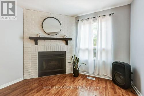 100 Sullivan Drive N, Ajax, ON - Indoor Photo Showing Living Room With Fireplace