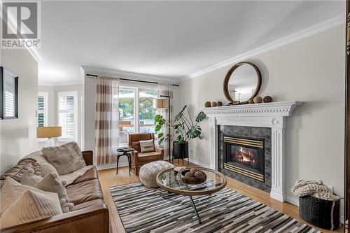 565 Dean Drive, Cornwall, ON - Indoor Photo Showing Living Room With Fireplace