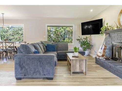 36 Anderson Crescent, Cranbrook, BC - Indoor Photo Showing Living Room With Fireplace