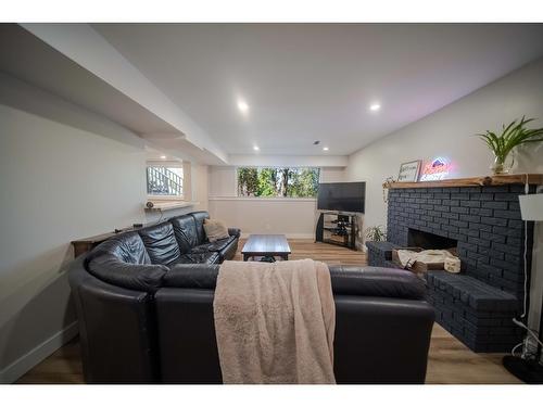 36 Anderson Crescent, Cranbrook, BC - Indoor Photo Showing Living Room With Fireplace