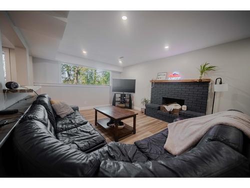 36 Anderson Crescent, Cranbrook, BC - Indoor Photo Showing Living Room With Fireplace