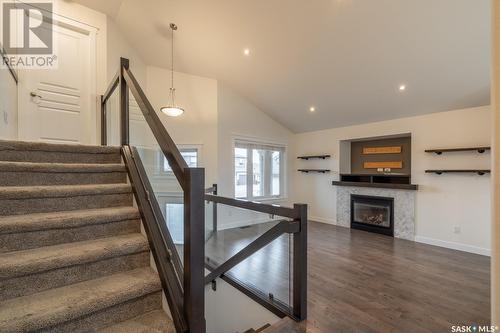 5114 Anthony Way, Regina, SK - Indoor Photo Showing Other Room With Fireplace