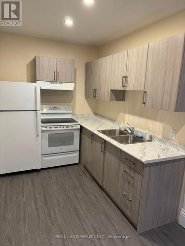 Unit 5 - 31 King Street E, Oshawa, ON - Indoor Photo Showing Kitchen With Double Sink