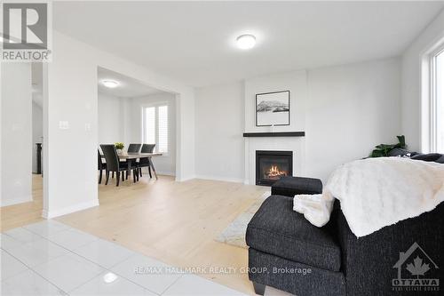 331 Finial Way, Ottawa, ON - Indoor Photo Showing Living Room With Fireplace