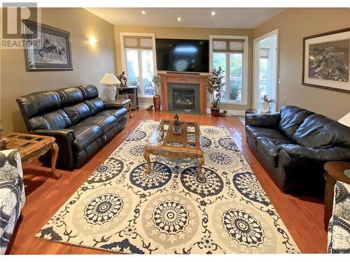 556 West Point Drive, Perth, ON - Indoor Photo Showing Living Room With Fireplace