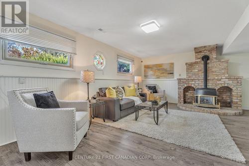 1096 Commissioners Road W, London, ON - Indoor Photo Showing Living Room With Fireplace