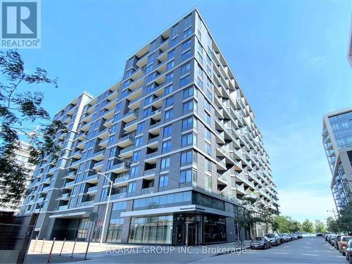 221 - 1 Edgewater Drive, Toronto, ON - Outdoor With Balcony With Facade