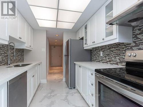 3008 - 77 Harbour Square, Toronto, ON - Indoor Photo Showing Kitchen With Double Sink With Upgraded Kitchen