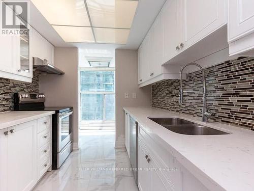 3008 - 77 Harbour Square, Toronto, ON - Indoor Photo Showing Kitchen With Double Sink