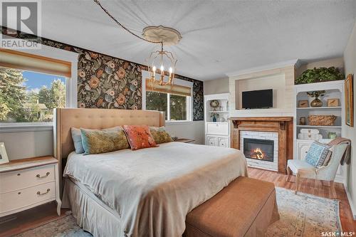 61 Malcolm Place, Saskatoon, SK - Indoor Photo Showing Bedroom With Fireplace