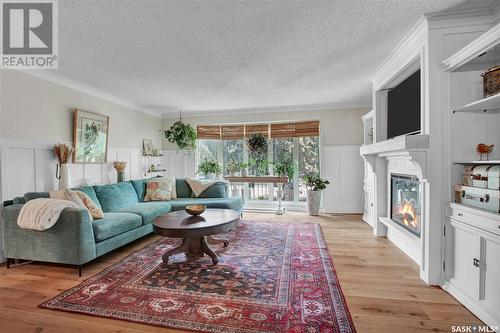 61 Malcolm Place, Saskatoon, SK - Indoor Photo Showing Living Room With Fireplace