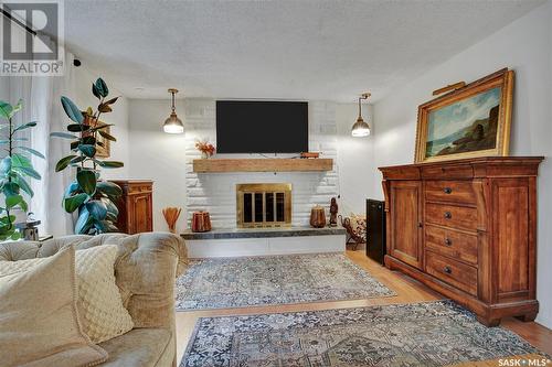 61 Malcolm Place, Saskatoon, SK - Indoor Photo Showing Living Room With Fireplace