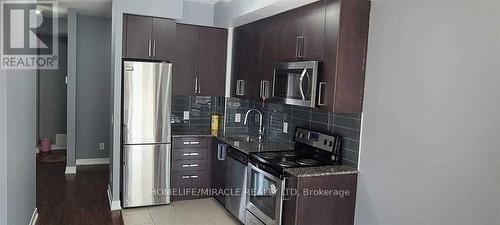 1301 - 840 Queen'S Plate Drive, Toronto, ON - Indoor Photo Showing Kitchen