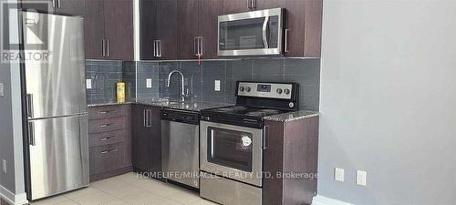 1301 - 840 Queen'S Plate Drive, Toronto (West Humber-Clairville), ON - Indoor Photo Showing Kitchen With Upgraded Kitchen