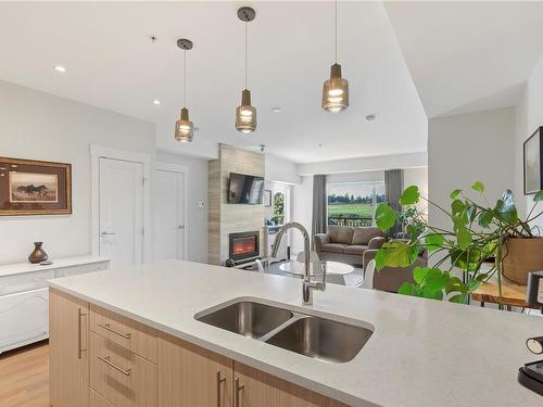 302-2500 Hackett Cres, Central Saanich, BC - Indoor Photo Showing Kitchen With Double Sink