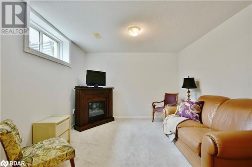 Above grade windows & quality carpet! - 165 Cheltenham Road, Barrie, ON - Indoor Photo Showing Other Room