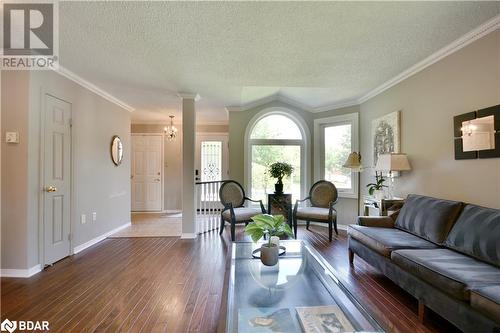 Bright open concept living room. - 165 Cheltenham Road, Barrie, ON - Indoor Photo Showing Living Room