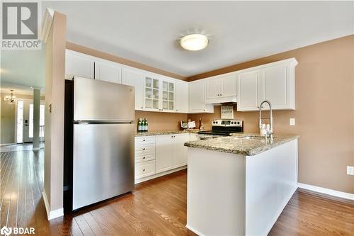 Lots of counter space & stunning hardwood! - 165 Cheltenham Road, Barrie, ON - Indoor Photo Showing Kitchen With Upgraded Kitchen