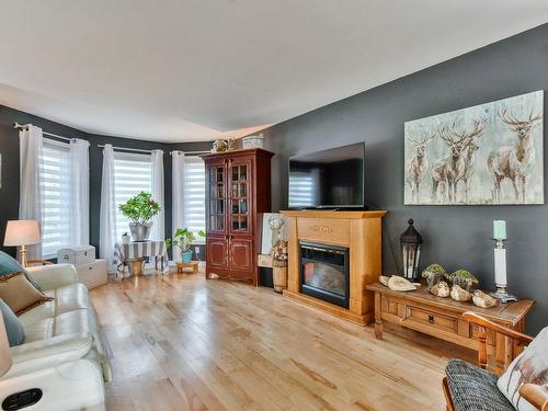 Salon - 56  - 56A Rue Jean-Dallaire, Blainville, QC - Indoor Photo Showing Living Room With Fireplace