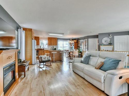 Vue d'ensemble - 56  - 56A Rue Jean-Dallaire, Blainville, QC - Indoor Photo Showing Living Room With Fireplace