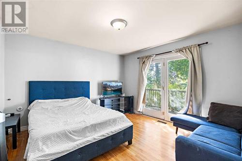 1468 Renfrew Drive Ne, Calgary, AB - Indoor Photo Showing Bedroom