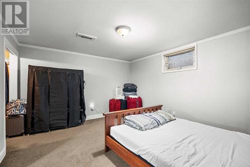 Basement Bedroom - 1468 Renfrew Drive Ne, Calgary, AB - Indoor Photo Showing Bedroom