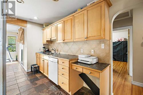 Kitchen - 1468 Renfrew Drive Ne, Calgary, AB - Indoor Photo Showing Kitchen With Double Sink