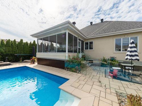 Backyard - 1207 Rue Étienne-Sanschagrin, Saint-Jean-Sur-Richelieu, QC - Outdoor With In Ground Pool With Deck Patio Veranda