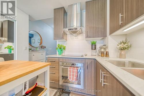 206 - 195 Bonis Avenue, Toronto, ON - Indoor Photo Showing Kitchen With Double Sink