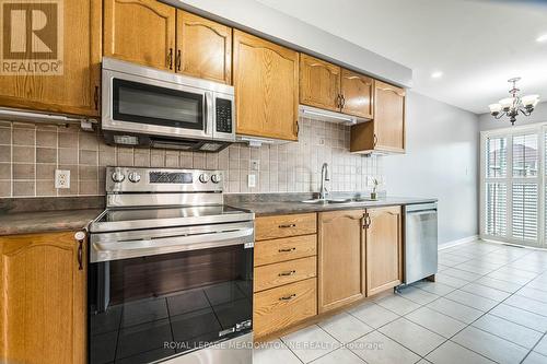 7059 Frontier Ridge, Mississauga, ON - Indoor Photo Showing Kitchen With Double Sink