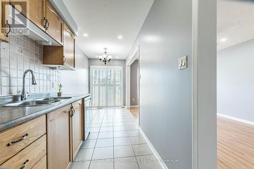 7059 Frontier Ridge, Mississauga, ON - Indoor Photo Showing Kitchen With Double Sink