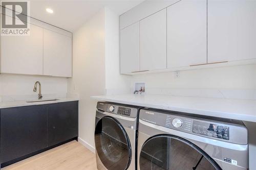 40 Patterson Rise Sw, Calgary, AB - Indoor Photo Showing Laundry Room