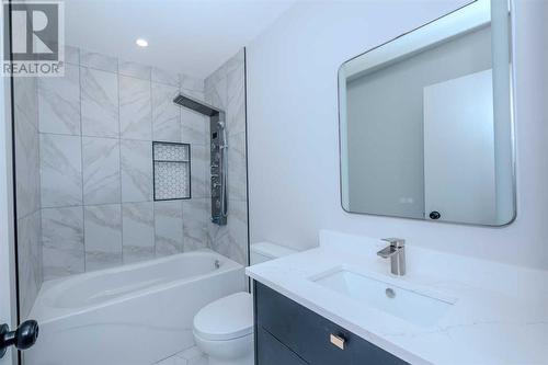 40 Patterson Rise Sw, Calgary, AB - Indoor Photo Showing Bathroom