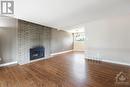 15 Ilkley Crescent, Ottawa, ON  - Indoor Photo Showing Living Room With Fireplace 