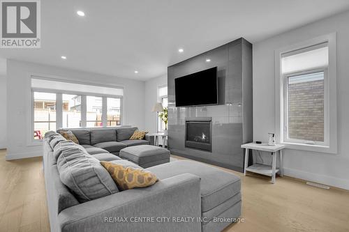 24 Locky Lane, Middlesex Centre (Kilworth), ON - Indoor Photo Showing Living Room With Fireplace