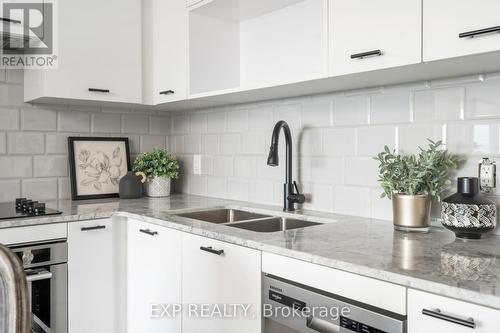 2124 - 275 Village Green Square, Toronto, ON - Indoor Photo Showing Kitchen With Double Sink With Upgraded Kitchen