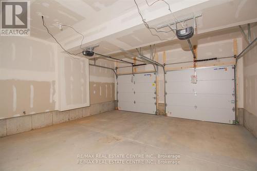 1123 Waterwheel Road E, London, ON - Indoor Photo Showing Garage