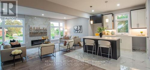 1123 Waterwheel Road E, London, ON - Indoor Photo Showing Living Room With Fireplace