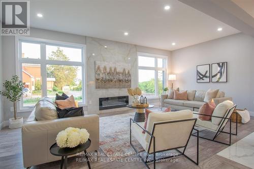 1123 Waterwheel Road E, London, ON - Indoor Photo Showing Living Room With Fireplace