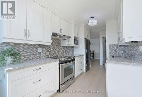 910 - 2365 Kennedy Road, Toronto, ON - Indoor Photo Showing Kitchen With Upgraded Kitchen