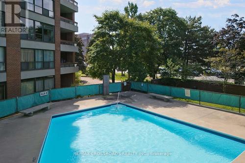 910 - 2365 Kennedy Road, Toronto, ON - Outdoor With In Ground Pool With Backyard